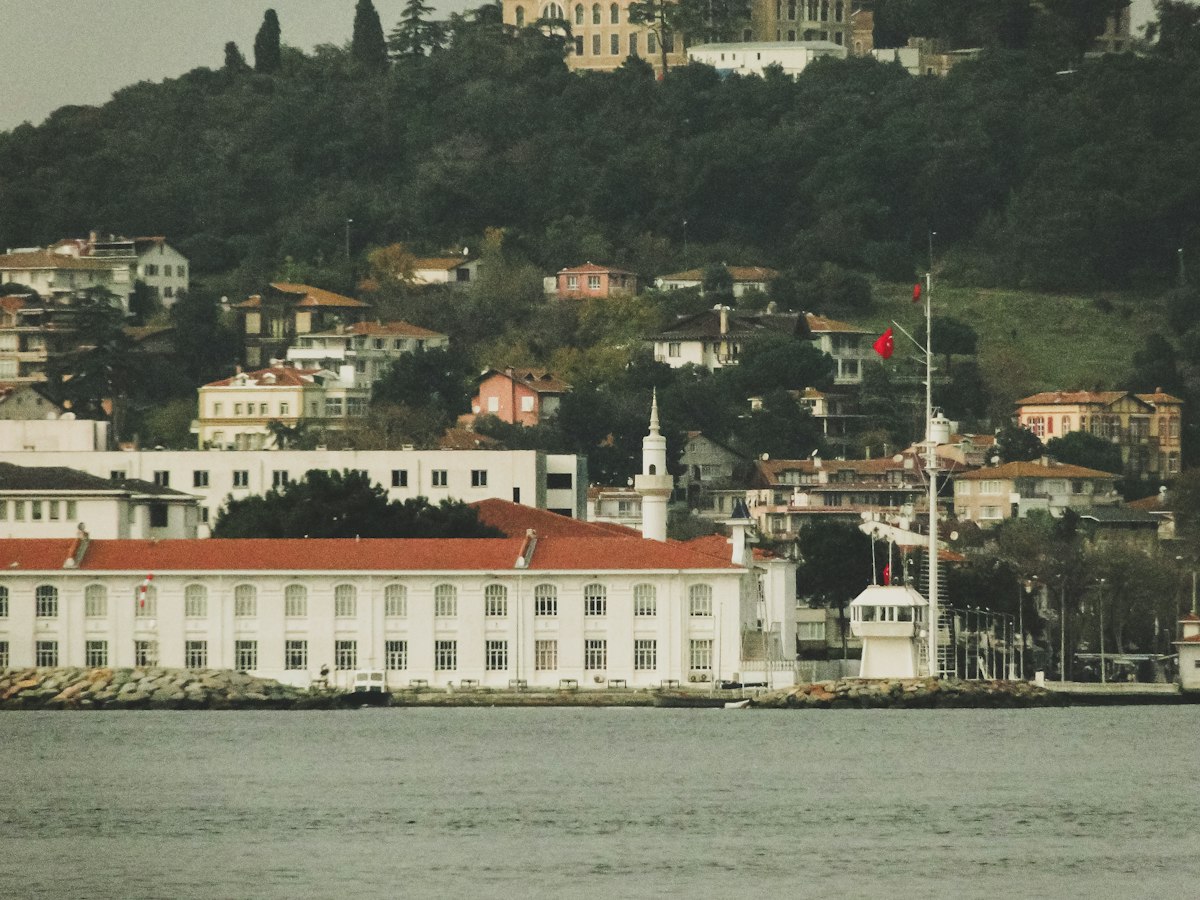 Büyükada vs Heybeliada comparison: Heybeliada waterfront and green hillside