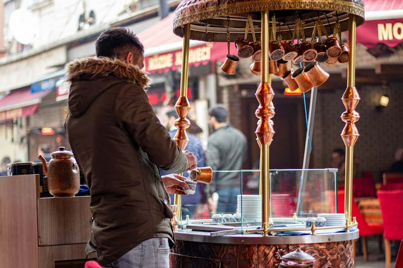 Turkish coffee prepared on heated sand at an Istanbul street stall