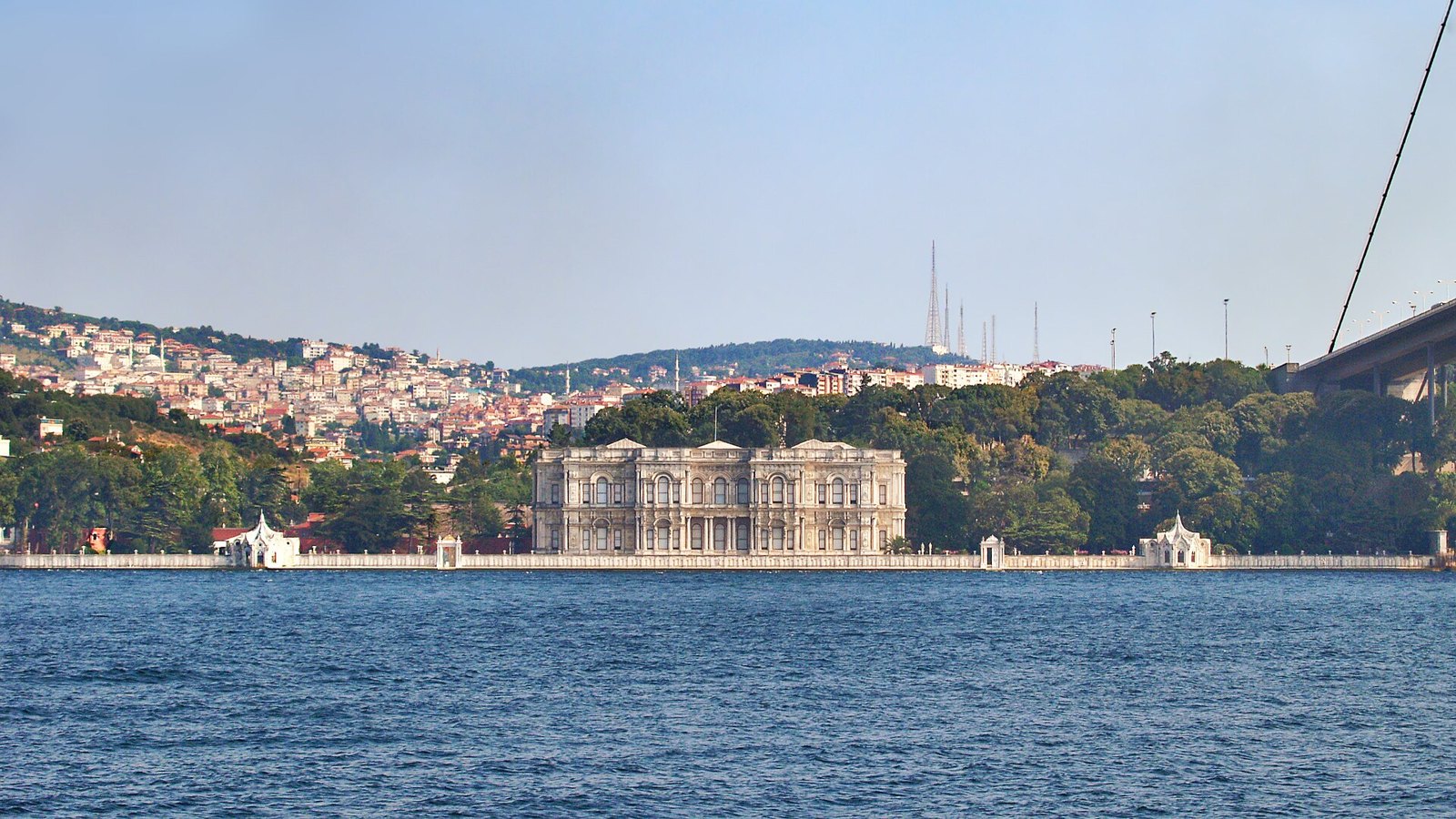 Beylerbeyi Palace seen across the Bosphorus with the suspension bridge rising beside it
