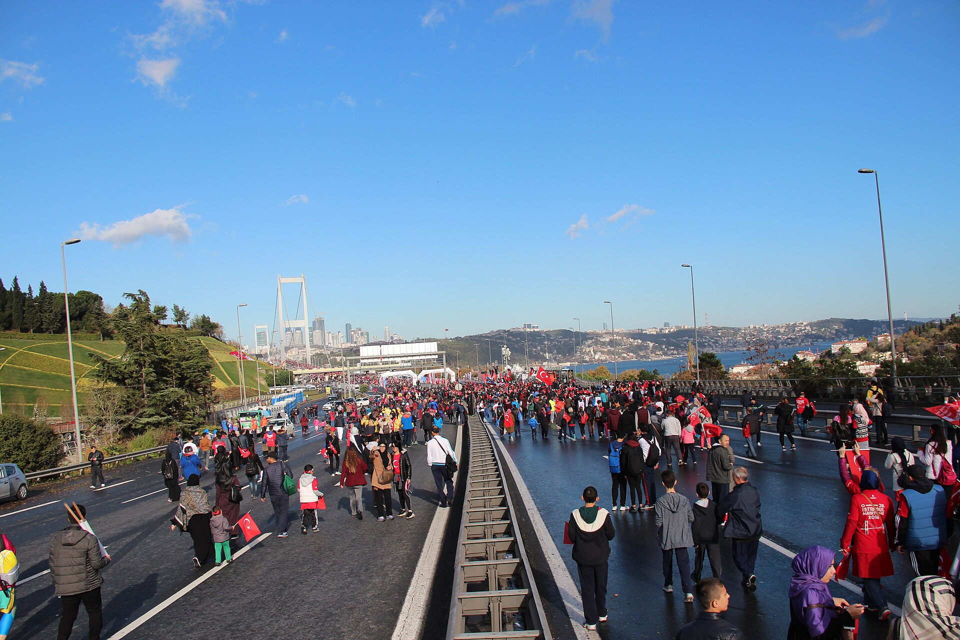 Runners filling a closed road on the Bosphorus Bridge during the Istanbul Marathon