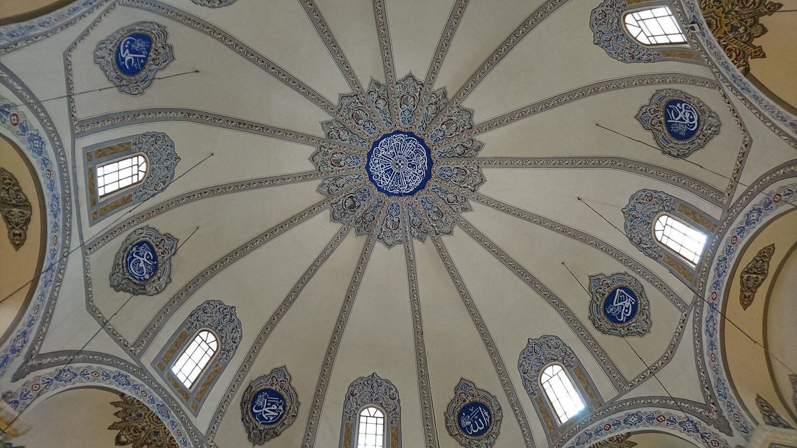 Ribbed dome of Little Hagia Sophia with painted medallions and arched windows
