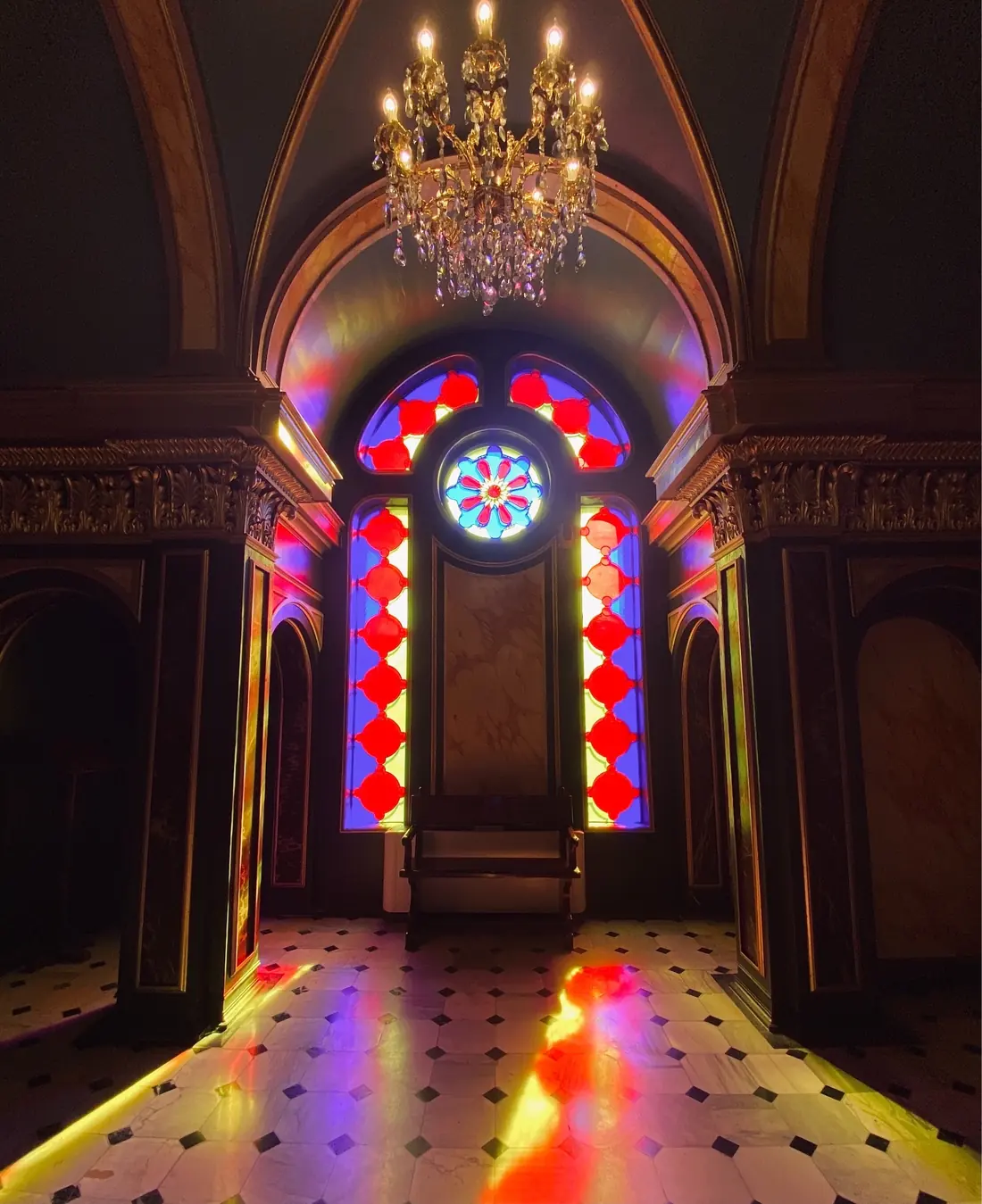 Colourful stained-glass window inside St Stephen Church in Balat